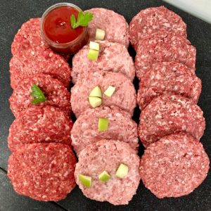Selection of burger patties including seasoned steak, pork and apple, and lamb and mint